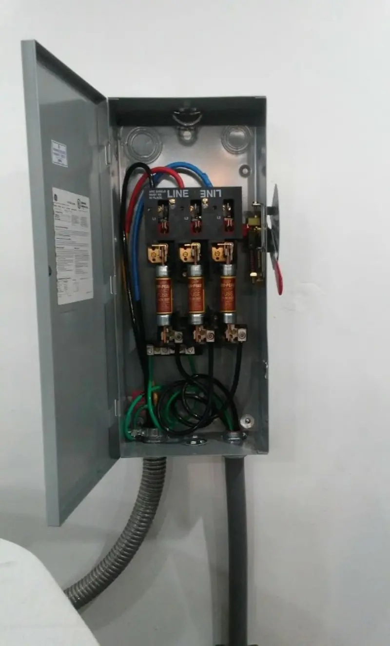 Three-phase disconnect switch installed for Smoke Detector Installation in Spencer